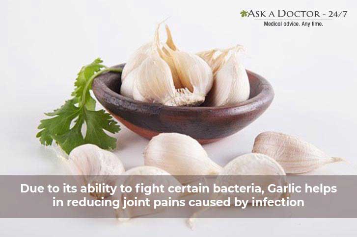  raw garlic pods kept in a bowl=