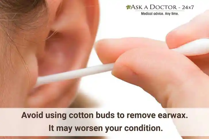  woman clean ear with cotton buds=