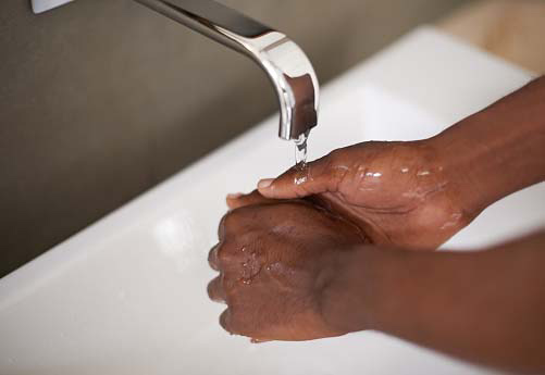 someone washing hands